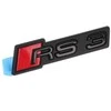 VAG NAUJAS ORIGINALUS AUDI RS3 8Y PRIEKINIS RADIATORIAUS GROTELIŲ EMBLEMA SU UŽRAŠTU BLIZGIA JUODA