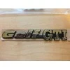 VAG VW Golf Mk3 galinė emblema originali 1H6853687ADZ10