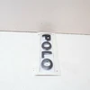 VAG VW POLO 6N Galinės bagažinės emblema ženklelis 6N0853687H739 NAUJA ORIGINALI