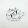 VOLVO XC70 MK2 priekinio bamperio grotelių emblema Originali 31383032