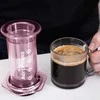 AeroPress – skaidrios rožinės spalvos kavos virimo aparatas
