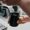 Rhinowares „Rhino Coffee Gear“ – silikoninė 600 ml pieno ąsočio rankena – geltona