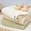 Meyco Baby medvilninis vonios rankšluostis su gobtuvu 75 × 75 cm, Soft Olive