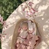 Vystyklas Mushie Rose Vanilla