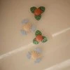 Mushie prilimpantis sukamasis žaislas (spinner) Dino
