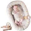 Taf Toys 2in1 kūdikio lavinamasis kilimėlis - lizdelis su žaidimų lanku Little Explorer, rusvai gelsvas