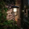 Aplica LED solara pentru exterior cu senzor de miscare Philips RADII ,1.3W, 4V, 250 lm, lumina calda (3000K), IP44, 192x240x175mm,Negru