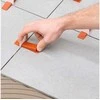 Tile levelling system 100 clips 100 wedges