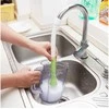Faucet brush extension for sink faucet