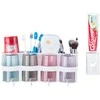 Toothbrush organiser cups toothpaste dispenser