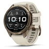„Garmin fenix 9 Pro“ išmanusis laikrodis, 43 mm, titano, rudens aukso spalvos su kreminės spalvos / prancūziško pilko silikono dirželiu