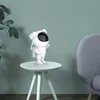 Žvaigždžių projektorius vaikams – astronauto naktinė lempa