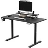 ULTRADESK HIGHLANDER Juodas Biurko su elektryczną regulacją aukščio su laikikliu ausinės i kable 120X60 cm, juoda