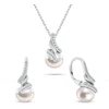 Brilio Silver Elegant jewelry set with real pearls SET298W (pakabukas, pendant, earrings)