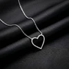 Brilio Silver Delicate sidabrinis pakabukas Heart with zircons NCL35W