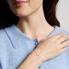 Fossil Nuostabi paauksuota apyrankė su perlamutru ir kristalais JF04866710