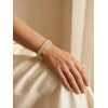 Marc Malone Shiny solid auksinis-plated steel bracelet Cecilia MCB250398G