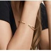 Tommy Hilfiger Gold-plated solid bracelet with crystals TH2780251