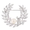 Troli Brooch with synthetic pearl and crystals