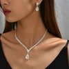Troli Dazzling jewelry set with clear crystals (pakabukas, earrings)