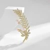 Troli Tender Branch brooch with genuine pearls and crystals Gold