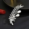 Troli Tender brooch Branch with genuine pearls and crystals Sidabrinis