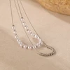 Troli Double steel pakabukas with synthetic pearls Sidabrinis