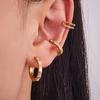 Troli Gold plated double single earring made of steel Gold