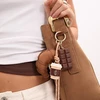 Troli Gold-plated handbag charm Croissant, coffee and chocolate