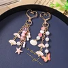 Troli Gold-plated handbag pendant Butterfly, fans and shells