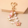Troli Gold-plated handbag pendant Butterfly, fans and shells