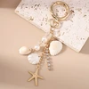 Troli Gold-plated pendant with crystals Sunny Beach
