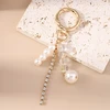 Troli Gold-plated pendant with crystals and synthetic pearls