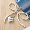 Troli Pearl handbag pendant Bow with heart