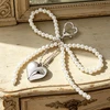 Troli Pearl handbag pendant Bow with heart