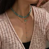Troli Turquoise bead pakabukas with real pearls Gold