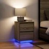 Spintelės prie lovos su LED lemputėmis 2 vnt Sonoma ąžuolas