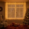 Užuolaidų girlianda 400 LED Šilta balta 600 x 200 cm