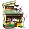 CaDA Building Blocks Kitty Shop Japoniško stiliaus pastato LED lemputė 921 dalys C66015W