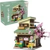 CaDA Building Blocks Kitty Shop Japoniško stiliaus pastato LED lemputė 921 dalys C66015W