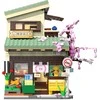 CaDA Building Blocks Kitty Shop Japoniško stiliaus pastato LED lemputė 921 dalys C66015W