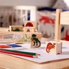 Dėlionė MELISSA & DOUG žaidimų rinkinys Dinozaurų antspaudų rinkinys