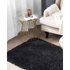 Beliani Shaggy kilimas CIDE juodas 80 x 150 cm
