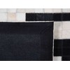 Beliani Kilimas BOLU juodas 80 x 150 cm natūrali oda