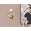 Sieninis šviestuvas Beliani Lampa ścienna LED PONUGA Metal Auksinis