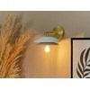 Sieninis šviestuvas Beliani Lampa ścienna LASOLO Metal Baltas