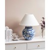 Beliani Lampa stołowa ARUNCA Porcelana Baltas/ mėlyna