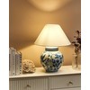 Beliani Lampa stołowa ARUNCA Porcelana Baltas/ mėlyna