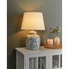 Beliani Lampa stołowa JAMAPA Porcelana Baltas/ mėlyna