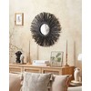 Beliani Round Rattan Wall Mirror Sun 60 cm Juoda KLASĖ